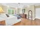 Relaxing main bedroom with hardwood floors, ample natural light, and neutral tones for a serene atmosphere at 39 Gabrielle Ct, Stockbridge, GA 30281