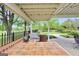 Covered outdoor kitchen featuring a built-in grill with an expansive countertop at 39 Gabrielle Ct, Stockbridge, GA 30281