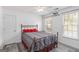 Cozy bedroom with ceiling fan, natural light, and an inspiring quote at 3065 Willow Park Dr, Dacula, GA 30019