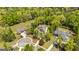 Stunning aerial view of a home and neighborhood surrounded by lush, mature trees at 410 Wicklow St, Tyrone, GA 30290
