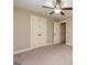 This bedroom features neutral walls, carpet, and a ceiling fan at 410 Wicklow St, Tyrone, GA 30290