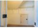 This walk in closet has metal shelving and a small access door at 410 Wicklow St, Tyrone, GA 30290