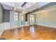 Dining room featuring hardwood floors and decorative lighting at 410 Wicklow St, Tyrone, GA 30290