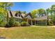 Beautiful exterior view of home showing porch and manicured lawn at 410 Wicklow St, Tyrone, GA 30290