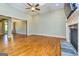 Spacious living room with hardwood floors, fireplace, and natural light at 410 Wicklow St, Tyrone, GA 30290