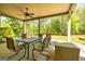 Covered patio with outdoor seating, perfect for relaxing and entertaining at 410 Wicklow St, Tyrone, GA 30290