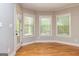 Sunroom with hardwood floors, a door to the backyard, and lots of natural light at 410 Wicklow St, Tyrone, GA 30290