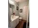 Bright bathroom with vanity, toilet, and linen closet at 411 Sherrels Frd, Peachtree City, GA 30269