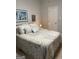 Cozy bedroom boasts decorative bedding, soft lighting, and a tranquil atmosphere at 411 Sherrels Frd, Peachtree City, GA 30269