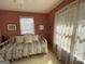 Bright bedroom with a daybed, a window, and neutral tones at 411 Sherrels Frd, Peachtree City, GA 30269