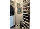 Spacious walk-in closet with custom shelving and ample storage space at 411 Sherrels Frd, Peachtree City, GA 30269