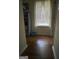 Hallway with hardwood floors at 411 Sherrels Frd, Peachtree City, GA 30269