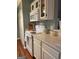 This kitchen has a range, microwave, and light-colored countertop at 411 Sherrels Frd, Peachtree City, GA 30269
