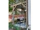 Patio features wooden pergola, view of back yard and seating at 411 Sherrels Frd, Peachtree City, GA 30269
