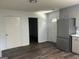 Spacious kitchen boasts stainless steel appliances, light gray cabinetry, and modern finishes at 30 Laurel Way, Covington, GA 30016