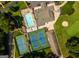 Overhead view of pool and tennis courts with lounging and recreation amenities in a neighborhood complex at 5133 Woodmond Dr, Villa Rica, GA 30180
