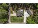 Aerial view of home with expansive lawn, patio, detached garage, and convenient RV parking space at 5133 Woodmond Dr, Villa Rica, GA 30180