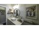 Bathroom with a modern sink, stylish vanity, and sleek fixtures at 5133 Woodmond Dr, Villa Rica, GA 30180
