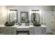 Bathroom features a dual vanity with vessel sinks, providing ample counter space and storage at 5133 Woodmond Dr, Villa Rica, GA 30180