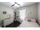 Bright bedroom with a comfortable bed and a chest of drawers at 5133 Woodmond Dr, Villa Rica, GA 30180