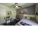 Bedroom with a comfortable bed and a doll house at 5133 Woodmond Dr, Villa Rica, GA 30180