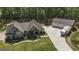 Beautiful home with a large driveway and three-car garage at 5133 Woodmond Dr, Villa Rica, GA 30180