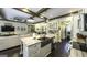 Spacious kitchen with stainless appliances, island sink, and dark hardwood floors at 5133 Woodmond Dr, Villa Rica, GA 30180