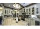 Kitchen island with marble countertops, pendant lighting, and stainless appliances at 5133 Woodmond Dr, Villa Rica, GA 30180