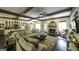 Open concept living room with fireplace, spacious kitchen, and dining area at 5133 Woodmond Dr, Villa Rica, GA 30180