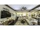 Spacious living room with comfortable seating, wooden ceiling beams, and television at 5133 Woodmond Dr, Villa Rica, GA 30180