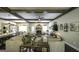 Open-concept living room featuring a fireplace, spacious kitchen, and a dining area at 5133 Woodmond Dr, Villa Rica, GA 30180
