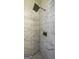 Close up of tiled shower featuring rainfall shower head and modern fixtures at 5133 Woodmond Dr, Villa Rica, GA 30180