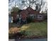 Charming brick home with traditional architectural details and mature trees in a mature neighborhood at 250 Mathewson Sw Pl, Atlanta, GA 30314