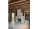 Living room showing brick fireplace and studs ready for renovation and remodeling at 250 Mathewson Sw Pl, Atlanta, GA 30314