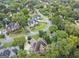 Overhead view of a well-maintained neighborhood with mature trees and landscaped yards at 3328 Sulky Se Cir, Marietta, GA 30067