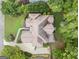An aerial view showcases the home's roof, backyard deck, and surrounding landscape at 3328 Sulky Se Cir, Marietta, GA 30067