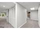 Finished basement area featuring neutral carpeting and louvered closet doors, offering ample storage space at 3328 Sulky Se Cir, Marietta, GA 30067