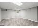 Bright basement area with neutral carpet and a small window, creating a comfortable living space at 3328 Sulky Se Cir, Marietta, GA 30067