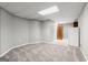 Spacious basement area featuring neutral carpet and a kitchenette, great for entertaining or relaxation at 3328 Sulky Se Cir, Marietta, GA 30067