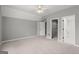 Neutral bedroom features ceiling fan, carpeted floors, and closet at 3328 Sulky Se Cir, Marietta, GA 30067