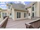 Exterior view of a home's brown deck, perfect for entertaining or relaxing outdoors at 3328 Sulky Se Cir, Marietta, GA 30067