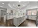 Renovated kitchen with a large island, granite countertops, and stainless steel appliances and access to the yard at 3328 Sulky Se Cir, Marietta, GA 30067
