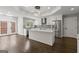 Spacious kitchen boasting white cabinets, granite countertops, stainless steel appliances, and a large island at 3328 Sulky Se Cir, Marietta, GA 30067