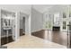 Bright living room boasting tall windows, fireplace, and dark wood flooring offers an elegant and inviting space at 3328 Sulky Se Cir, Marietta, GA 30067