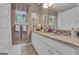 Charming bathroom featuring granite countertops, double sinks, and a unique cat-themed shower curtain at 11 Frances Turn, Sharpsburg, GA 30277