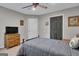 Comfortable bedroom showcasing comfortable single bed, a media center, and themed decor at 11 Frances Turn, Sharpsburg, GA 30277