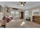 Spacious bonus room with ample light, ceiling fan, and rustic decor with a mounted deer head at 11 Frances Turn, Sharpsburg, GA 30277