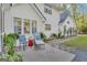 Charming home with a cozy patio featuring stylish seating and lush greenery, offering a relaxing outdoor space at 11 Frances Turn, Sharpsburg, GA 30277