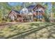 Charming brick home featuring blue shutters and a well-manicured lawn, providing curb appeal at 11 Frances Turn, Sharpsburg, GA 30277