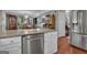 Modern kitchen with granite countertops, stainless steel appliances, and ample cabinet space at 11 Frances Turn, Sharpsburg, GA 30277